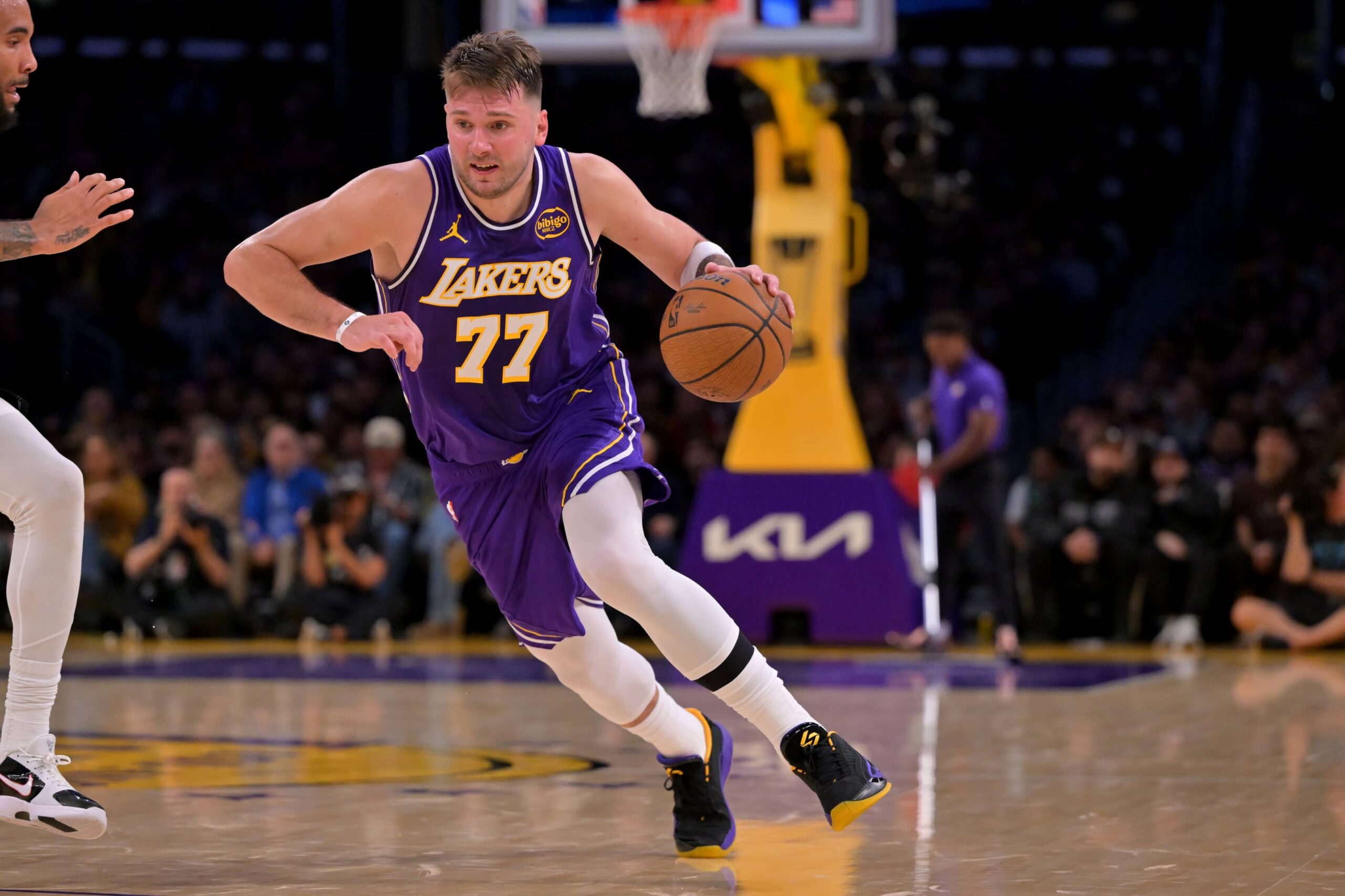 Los Angeles, California, USA; Los Angeles Lakers guard Luka Doncic (77) handles the ball during the second half against the San Antonio Spurs at Crypto.com Arena. Mandatory Credit: Jayne Kamin-Oncea-Imagn Images