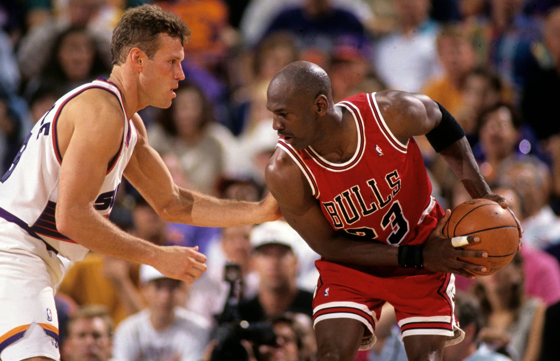 Suns guard Dan Majerle defends Bulls guard Michael Jordan during Game 1 of the NBA Finals in 1993 in Phoenix.