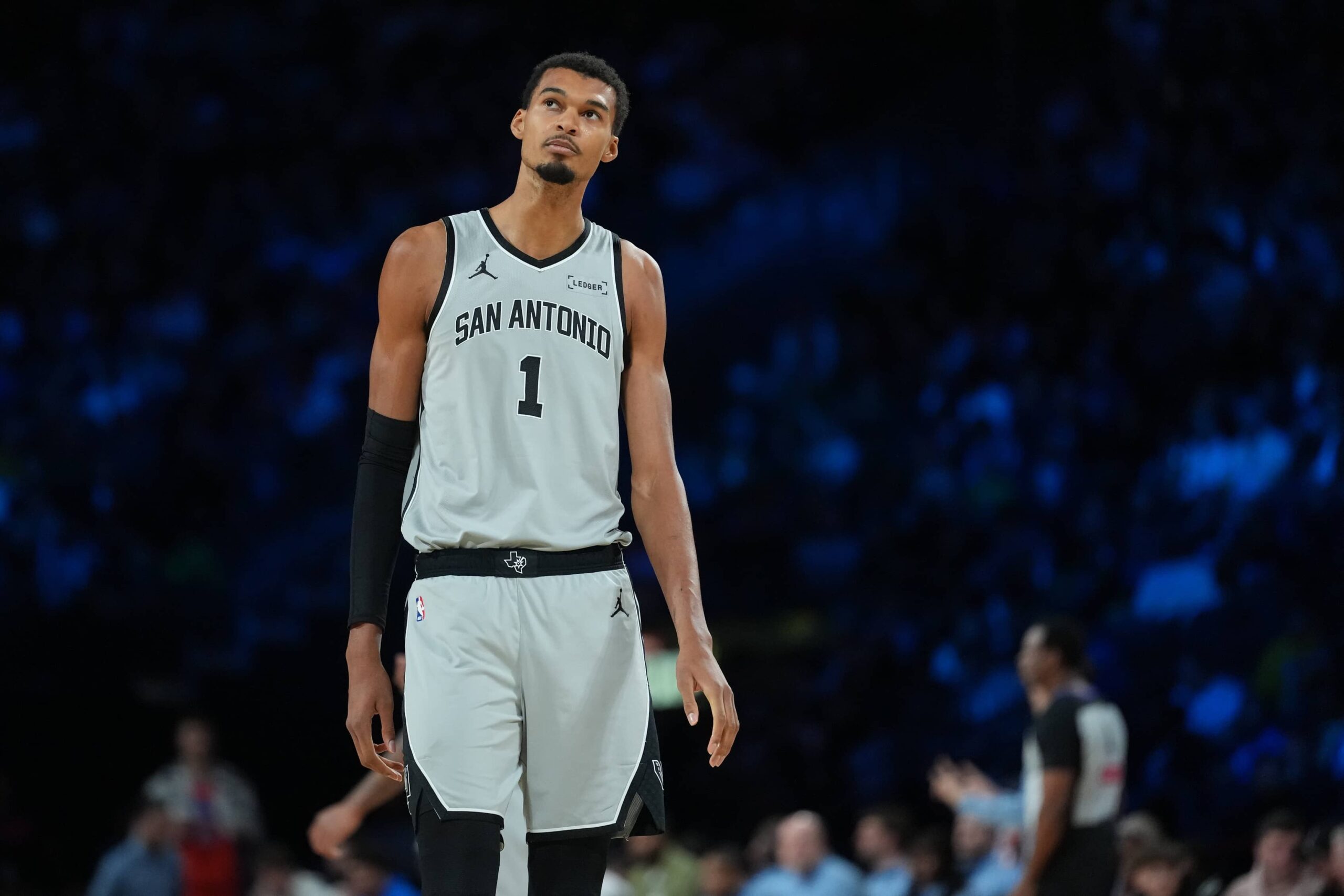 Las Vegas, Nevada, USA; San Antonio Spurs forward Victor Wembanyama (1) stands on the court against the Oklahoma City Thunder during the second quarter at T-Mobile Arena. Mandatory Credit: Kirby Lee-Imagn Images