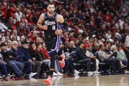 Chicago, Illinois, USA; Sacramento Kings guard Zach LaVine (8) reacts during the first half of an NBA game against the Chicago Bulls at United Center. Mandatory Credit: Kamil Krzaczynski-Imagn Images