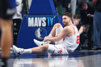 Jan 3, 2026; Dallas, Texas, USA; Houston Rockets center Alperen Sengun (28) lays injured during the first quarter against the Dallas Mavericks at American Airlines Center. Mandatory Credit: Kevin Jairaj-Imagn Images