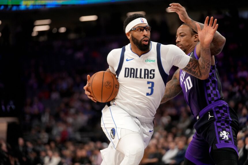 Jan 6, 2026; Sacramento, California, USA; Dallas Mavericks forward Anthony Davis (3) drives past Sacramento Kings guard DeMar DeRozan (10) in the first quarter at the Golden 1 Center. Mandatory Credit: Cary Edmondson-Imagn Images