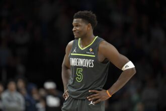 Jan 11, 2026; Minneapolis, Minnesota, USA; Minnesota Timberwolves guard Anthony Edwards (5) looks on against the San Antonio Spurs in the second half at Target Center. Mandatory Credit: Jesse Johnson-Imagn Images