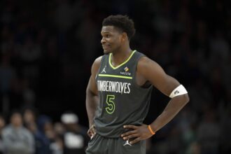 Jan 11, 2026; Minneapolis, Minnesota, USA; Minnesota Timberwolves guard Anthony Edwards (5) looks on against the San Antonio Spurs in the second half at Target Center. Mandatory Credit: Jesse Johnson-Imagn Images