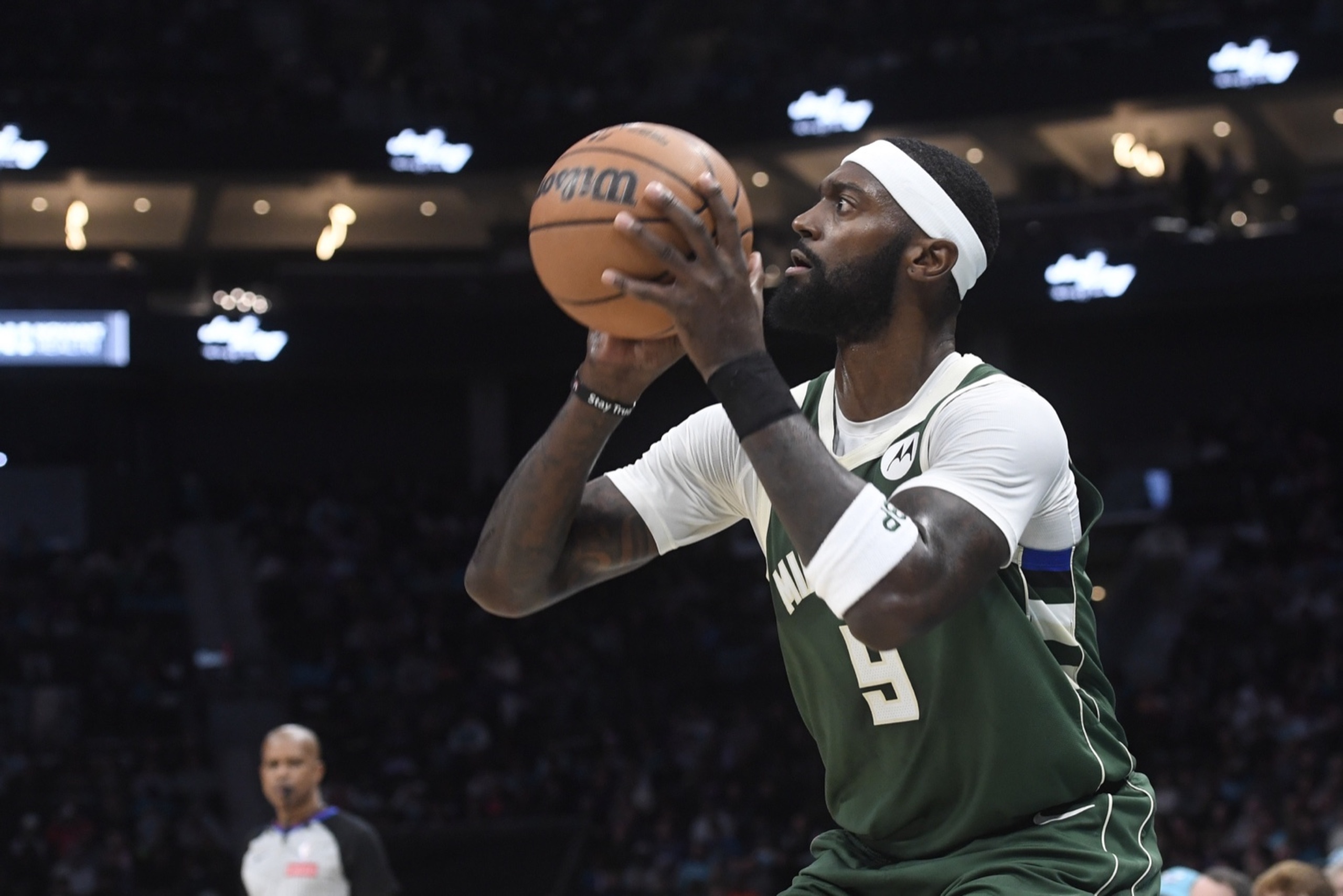 Dec 29, 2025; Charlotte, North Carolina, USA; Milwaukee Bucks forward center Bobby Portis (9) shoots during the first half against the Charlotte Hornets at the Spectrum Center. Mandatory Credit: Sam Sharpe-Imagn Images