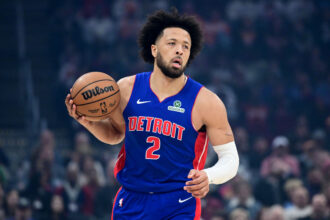 Jan 4, 2026; Cleveland, Ohio, USA; Detroit Pistons guard Cade Cunningham (2) brings the ball up court against the Cleveland Cavaliers during the first quarter at Rocket Arena. Mandatory Credit: Ken Blaze-Imagn Images