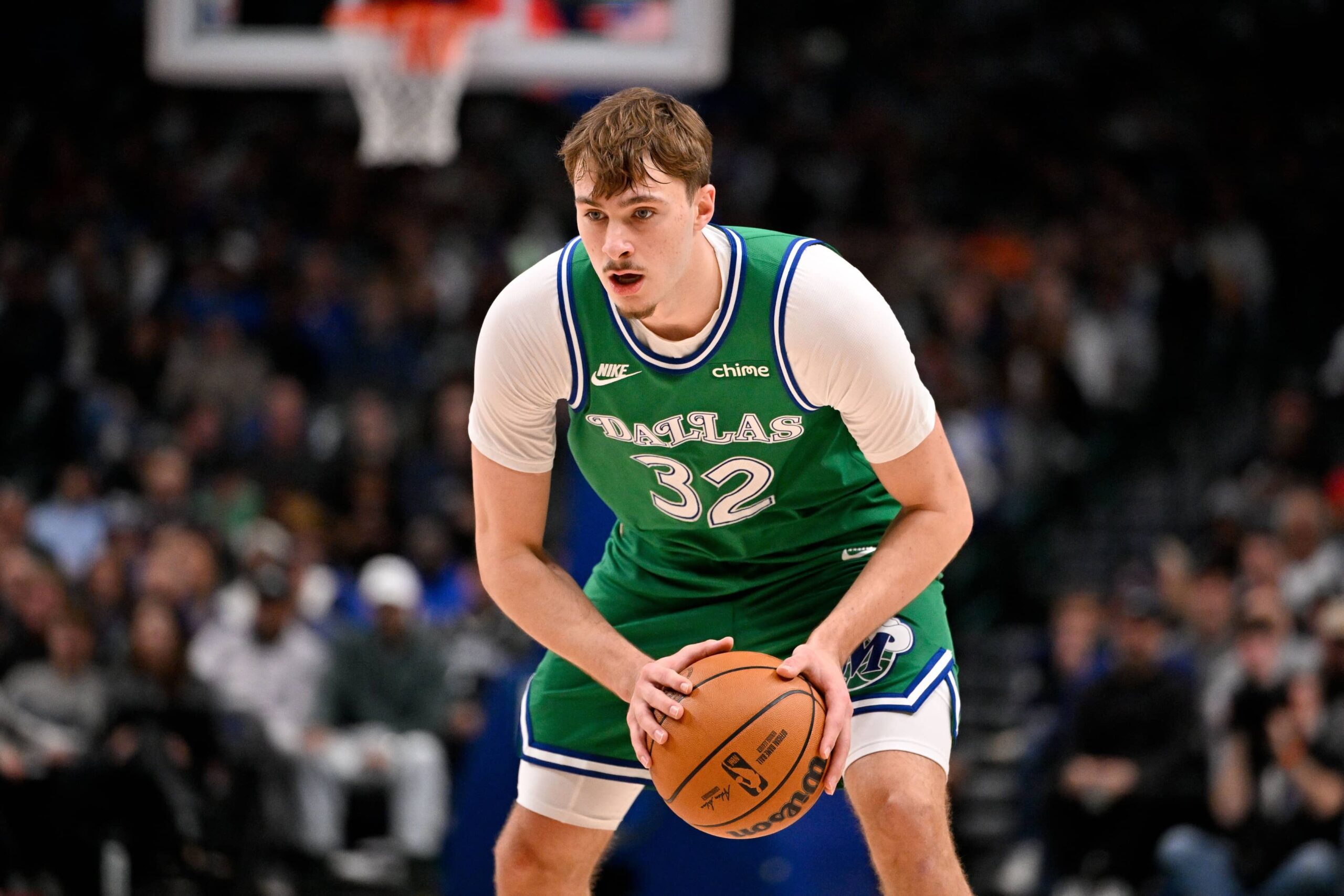 Jan 12, 2026; Dallas, Texas, USA; Dallas Mavericks forward Cooper Flagg (32) looks to move the ball against the Brooklyn Nets during the second quarter at the American Airlines Center. Mandatory Credit: Jerome Miron-Imagn Images