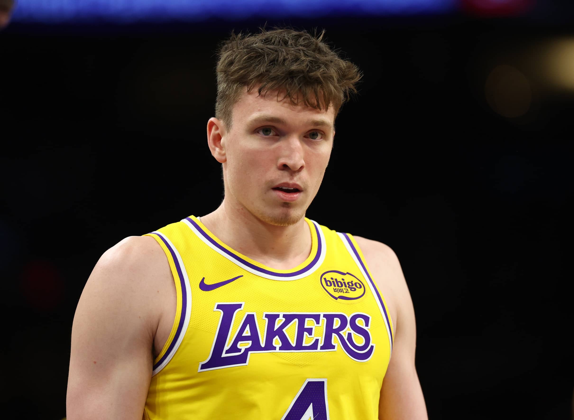 Dec 23, 2025; Phoenix, Arizona, USA; Los Angeles Lakers forward Dalton Knecht (4) against the Phoenix Suns at Mortgage Matchup Center. Mandatory Credit: Mark J. Rebilas-Imagn Images