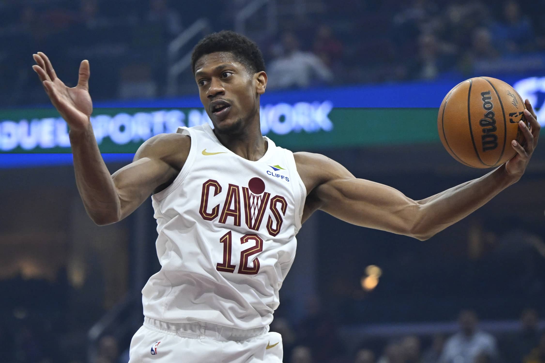 Dec 3, 2025; Cleveland, Ohio, USA; Cleveland Cavaliers forward De'Andre Hunter (12) rebounds in the first quarter against the Portland Trail Blazers at Rocket Arena. Mandatory Credit: David Richard-Imagn Images