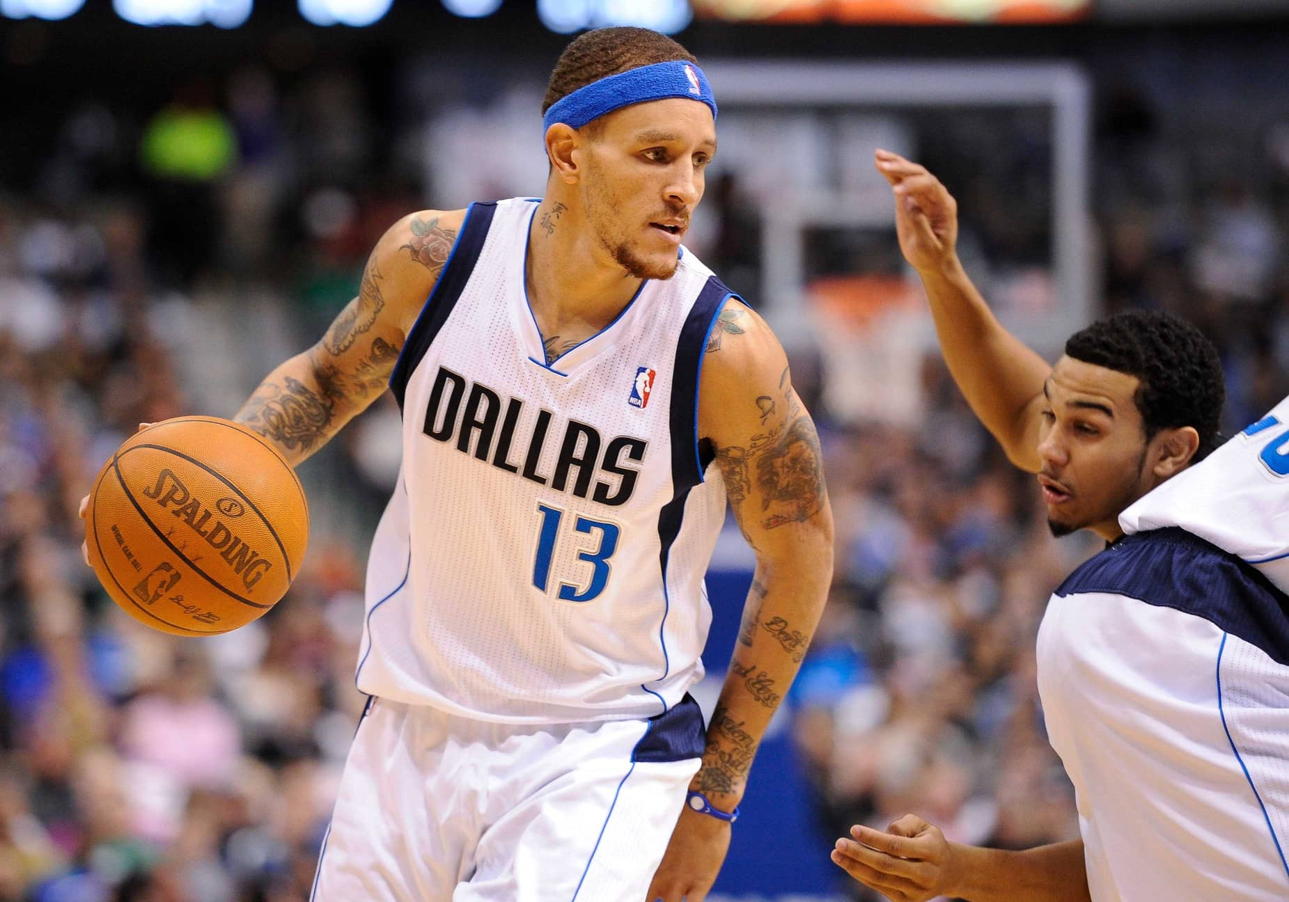 Jan 29, 2012; Dallas, TX, USA; Dallas Mavericks shooting guard Delonte West (13) brings the ball up the court against the San Antonio Spurs during the game at the American Airlines Center. The Mavericks defeated the Spurs 101-100. Mandatory Credit: Jerome Miron-Imagn Images