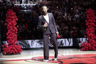 Jan 4, 2025; Chicago, Illinois, USA; Chicago Bulls and New York Knicks former player Derrick Rose speaks as he is honored at halftime of a game between the Chicago Bulls and the New York Knicks at United Center. Mandatory Credit: David Banks-Imagn Images
