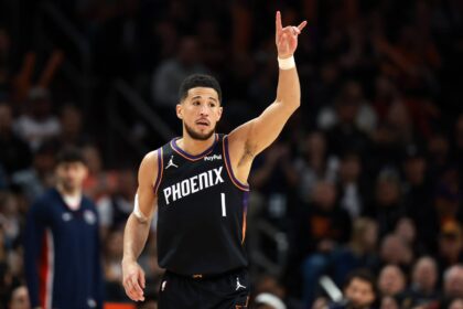 Phoenix Suns guard Devin Booker (1) reacts against the Washington Wizards in the first half at Mortgage Matchup Center.