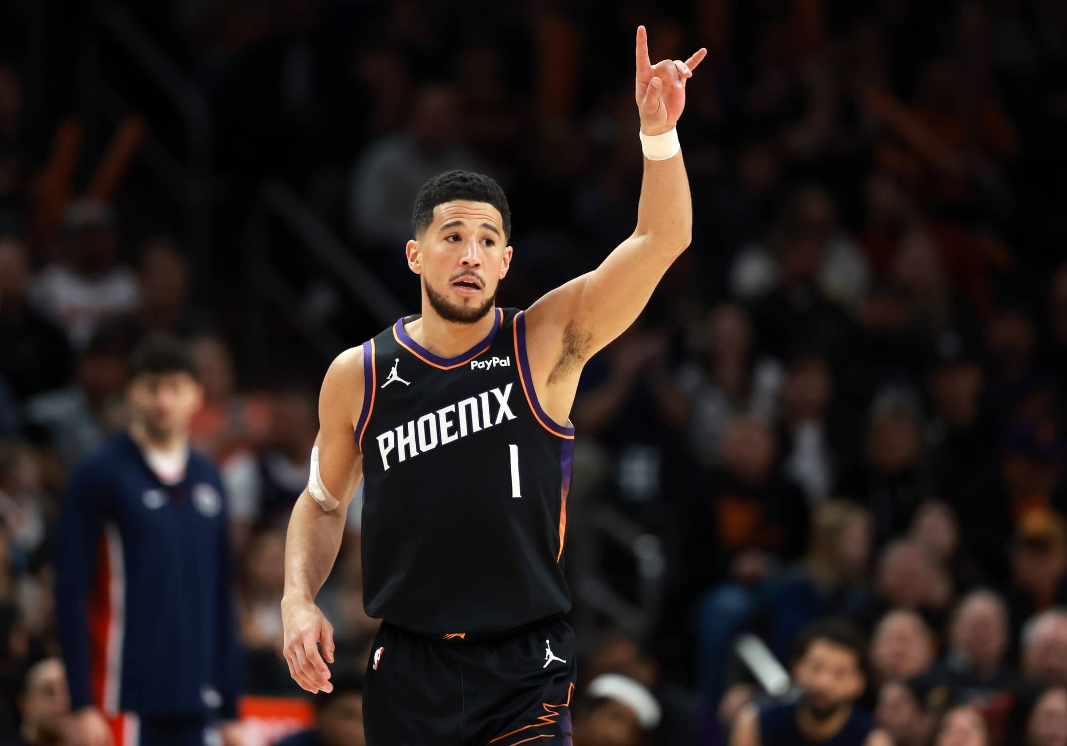 Phoenix Suns guard Devin Booker (1) reacts against the Washington Wizards in the first half at Mortgage Matchup Center.