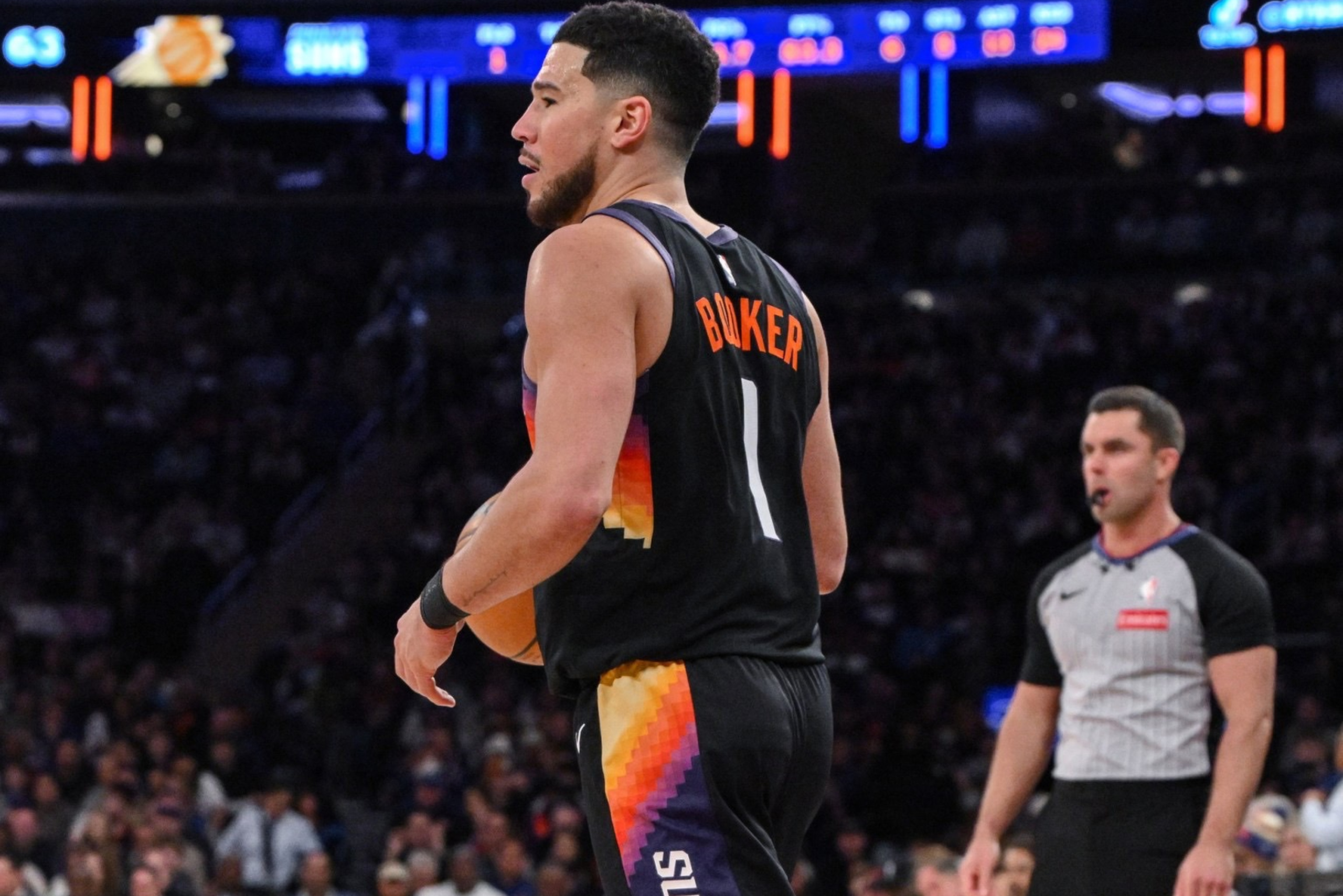 Jan 17, 2026; New York, New York, USA; Phoenix Suns guard Devin Booker (1) sets the play during the second half against the New York Knicks at Madison Square Garden. Mandatory Credit: John Jones-Imagn Images