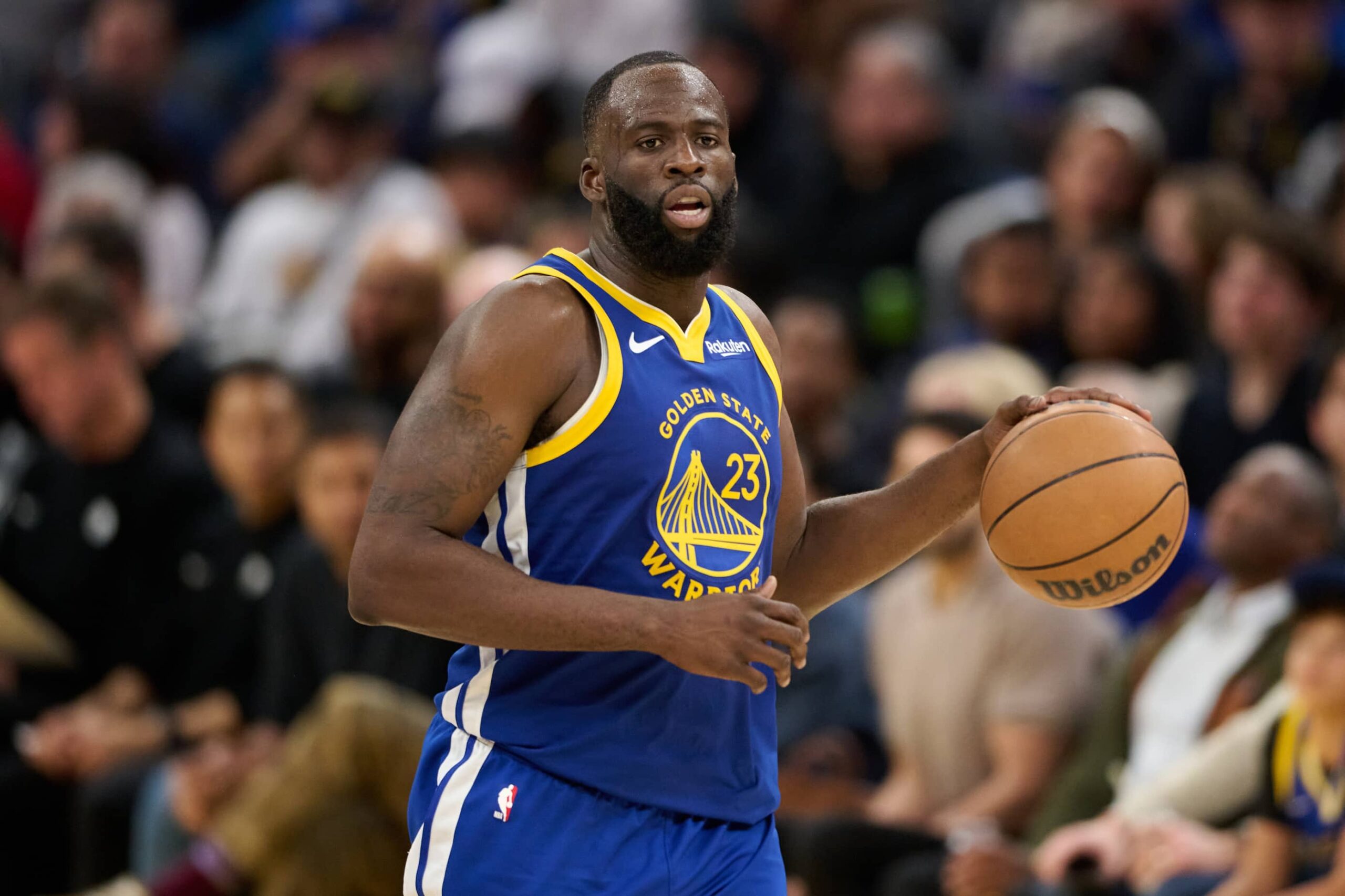 Jan 7, 2026; San Francisco, California, USA; Golden State Warriors forward Draymond Green (23) brings the ball up court against the Milwaukee Bucks during the fourth quarter at Chase Center. Mandatory Credit: Robert Edwards-Imagn Images