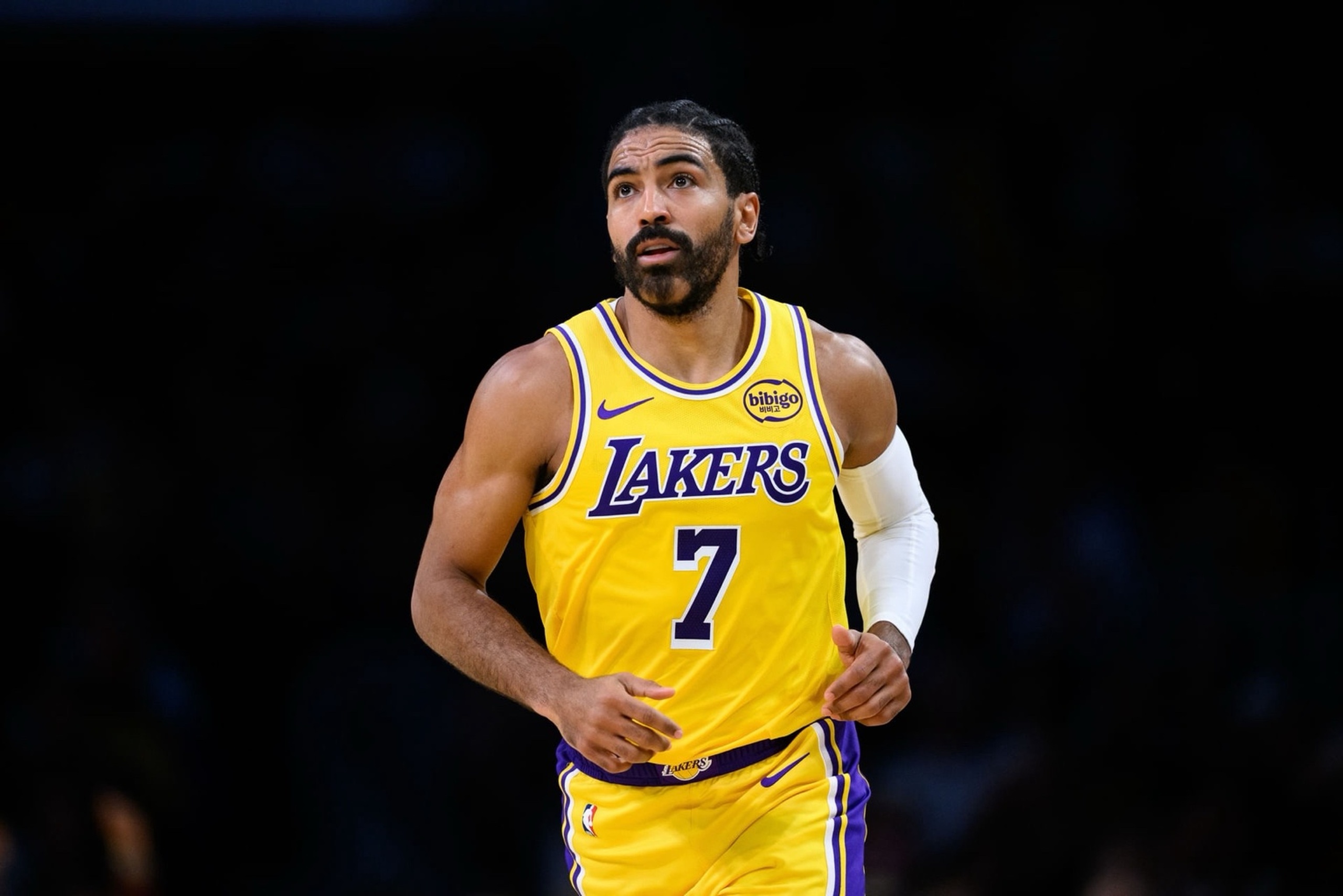 Oct 17, 2025; Los Angeles, California, USA; Los Angeles Lakers guard Gabe Vincent (7) looks on during the first half against the Sacramento Kings at Crypto.com Arena. Mandatory Credit: William Liang-Imagn Images