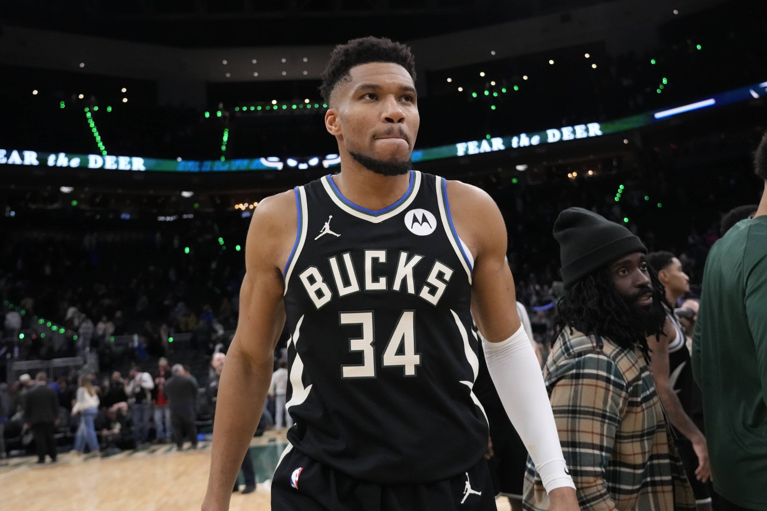 Milwaukee Bucks forward Giannis Antetokounmpo (34) walks from the court following the game against the Denver Nuggets at Fiserv Forum.