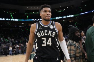 Jan 23, 2026; Milwaukee, Wisconsin, USA; Milwaukee Bucks forward Giannis Antetokounmpo (34) walks from the court following the game against the Denver Nuggets at Fiserv Forum. Mandatory Credit: Jeff Hanisch-Imagn Images