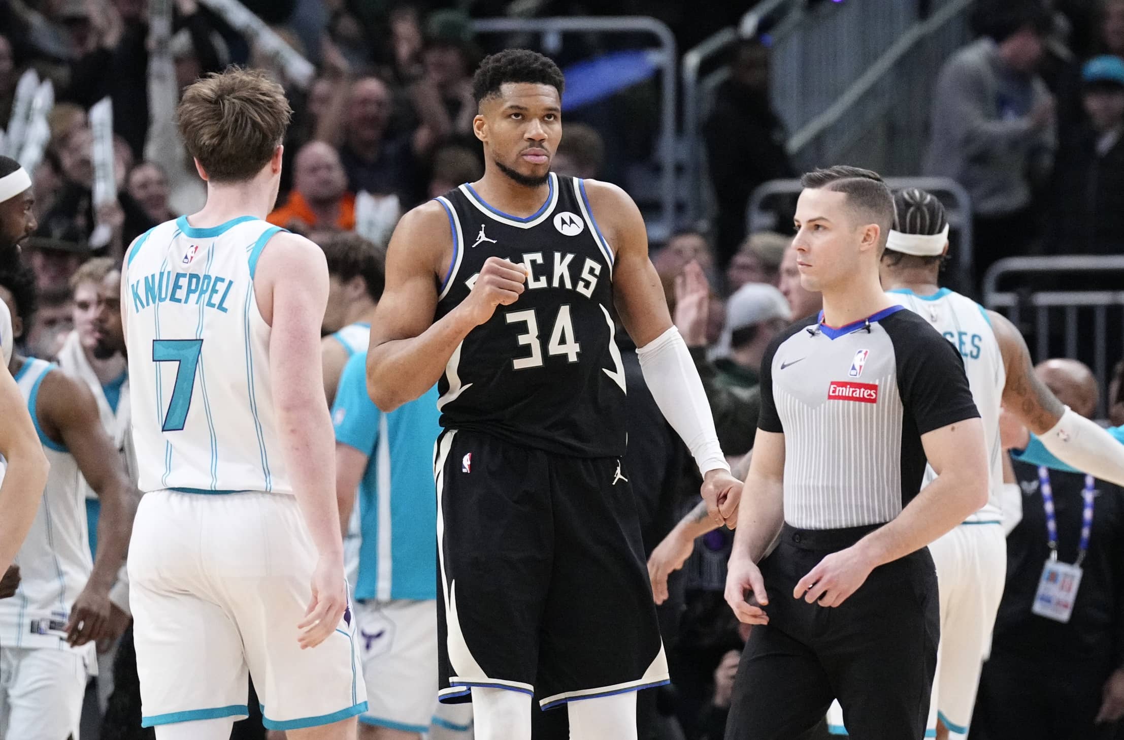 Milwaukee Bucks forward Giannis Antetokounmpo (34) celebrates a 122-121 win over the Charlotte Hornets at Fiserv Forum.