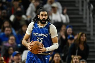 San Francisco, California, USA; Orlando Magic center Goga Bitadze (35) celebrates against the Golden State Warriors in the third quarter at Chase Center. Mandatory Credit: Eakin Howard-Imagn Images