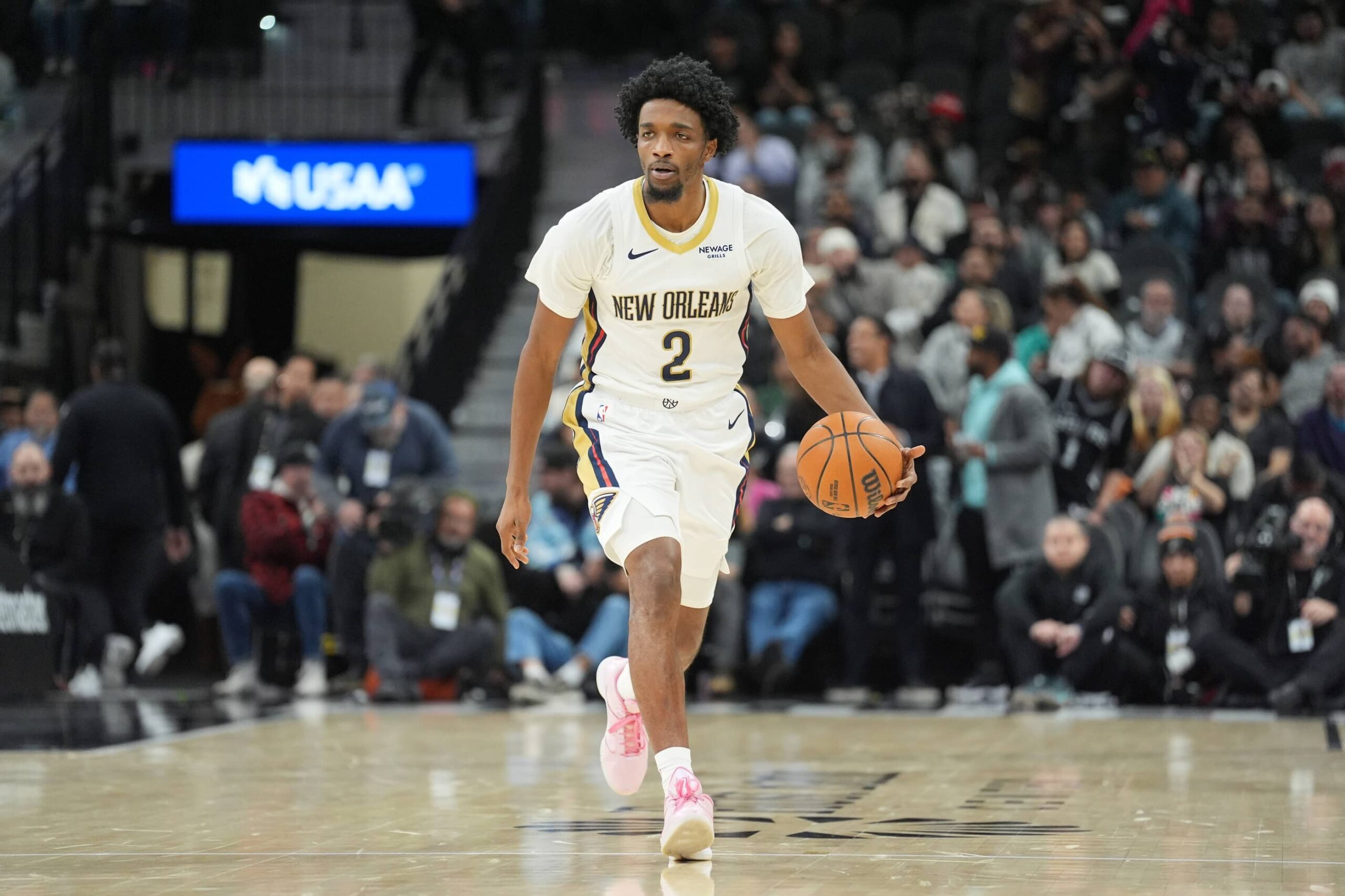 Jan 25, 2026; San Antonio, Texas, USA; New Orleans Pelicans forward Herbert Jones (2) dribbles up the court in the second half against the San Antonio Spurs at Frost Bank Center. Mandatory Credit: Daniel Dunn-Imagn Images