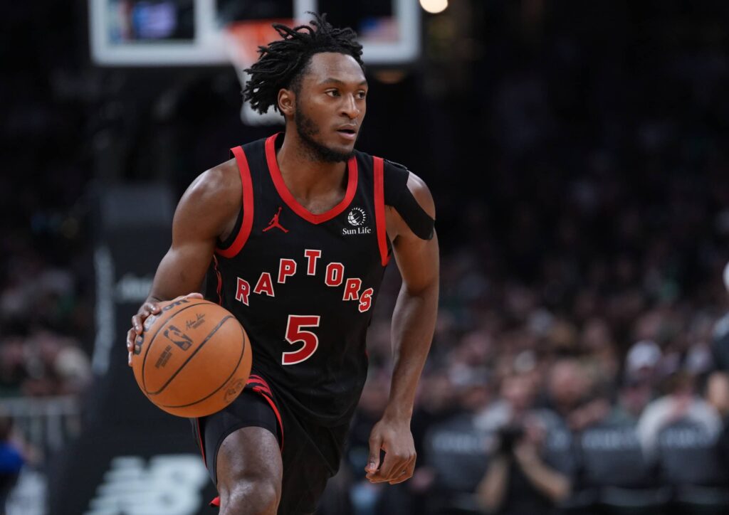 Jan 9, 2026; Boston, Massachusetts, USA; Toronto Raptors guard Immanuel Quickley (5) returns the ball against the Boston Celtics in the second half at TD Garden. Mandatory Credit: David Butler II-Imagn Images