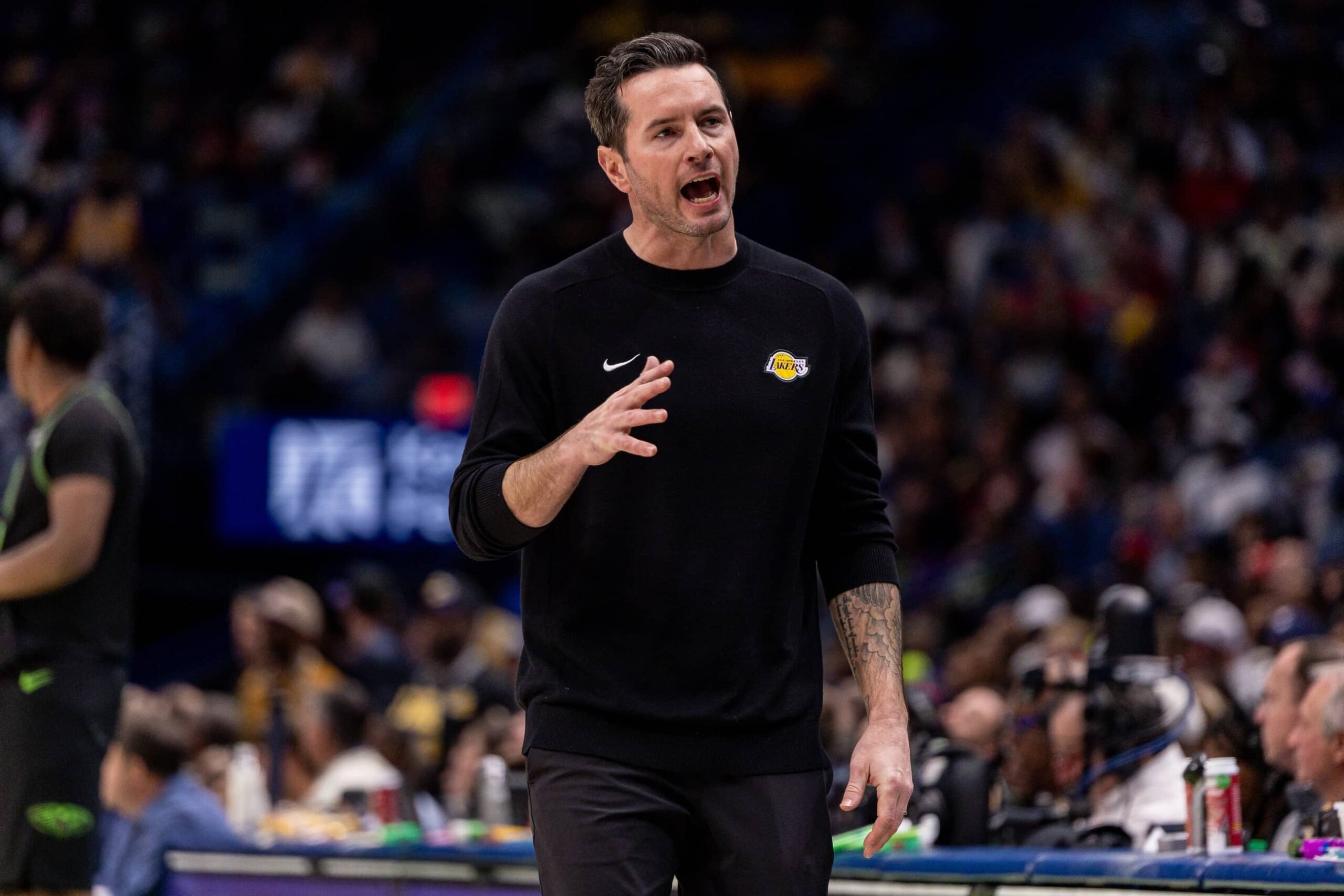 Los Angeles Lakers Head Coach JJ Redick reacts to a play against the New Orleans Pelicans during the second half at Smoothie King Center.