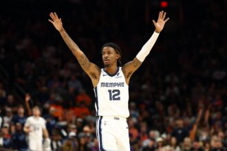 Memphis Grizzlies guard Ja Morant (12) reacts against the Phoenix Suns during the second half at the Mortgage Matchup Center.