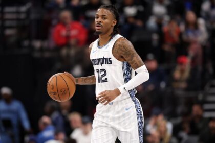 Dec 15, 2025; Inglewood, California, USA; Memphis Grizzlies guard Ja Morant (12) brings the ball up court during the third quarter against the Los Angeles Clippers at Intuit Dome. Mandatory Credit: Kiyoshi Mio-Imagn Images