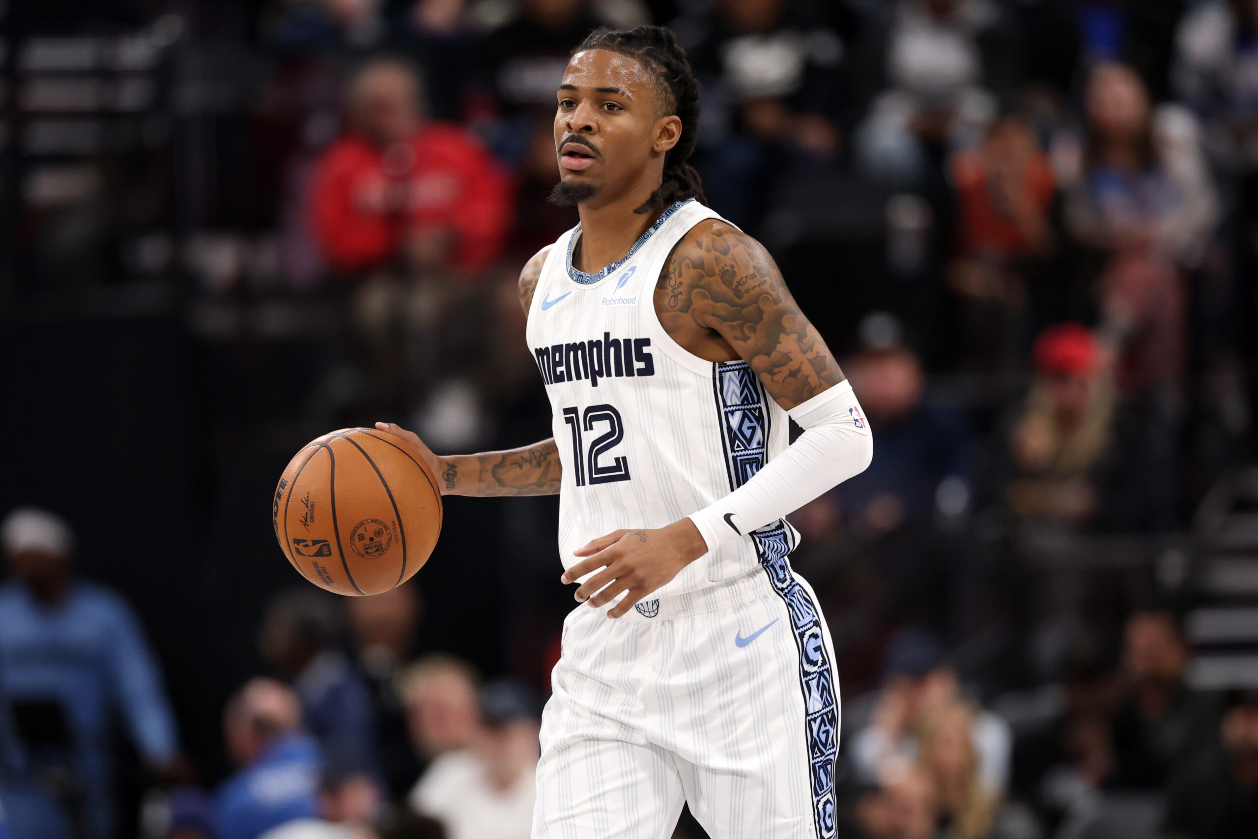 Inglewood, California, USA; Memphis Grizzlies guard Ja Morant (12) brings the ball up court during the third quarter against the Los Angeles Clippers at Intuit Dome. Mandatory Credit: Kiyoshi Mio-Imagn Images