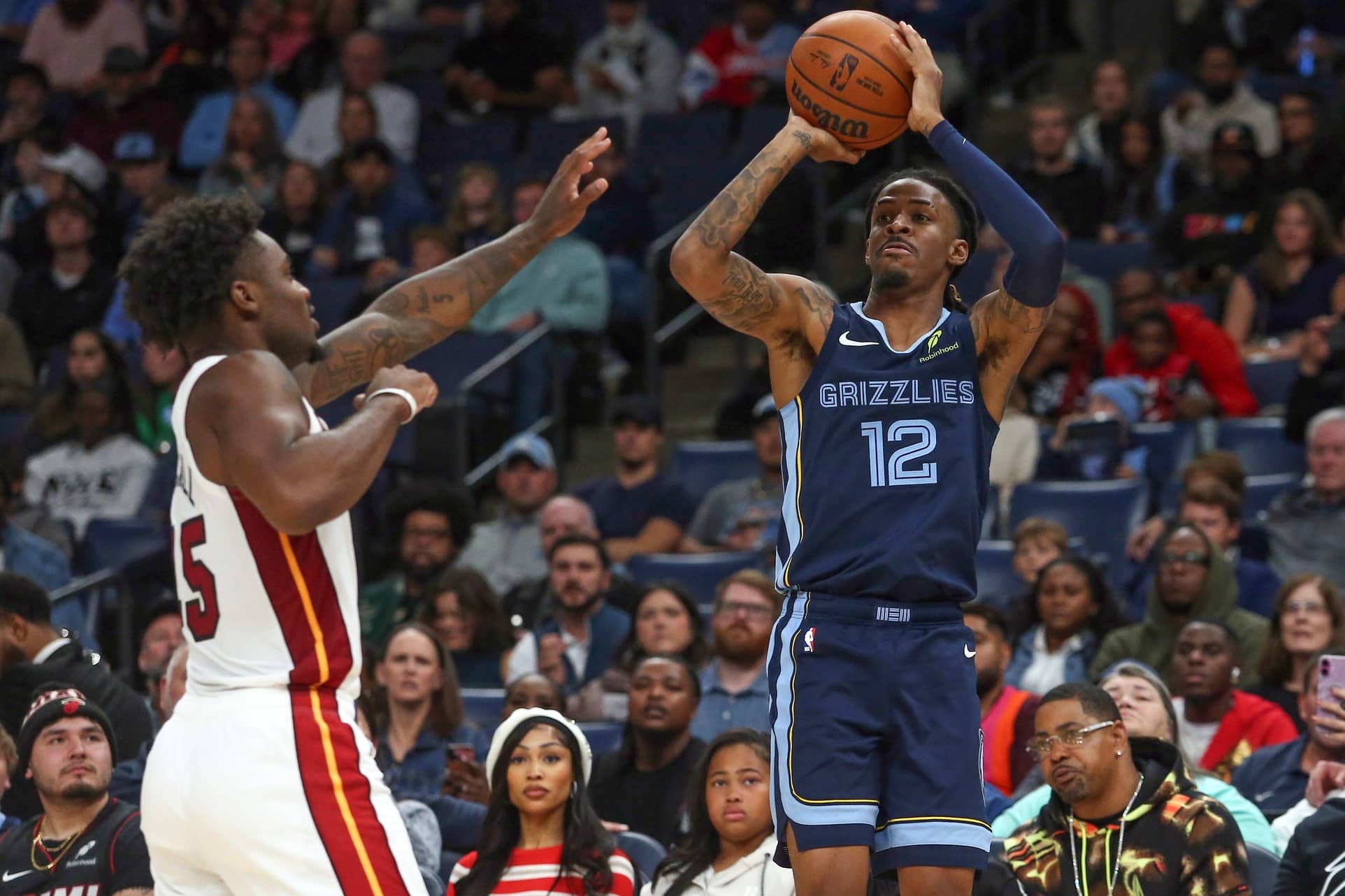Oct 24, 2025; Memphis, Tennessee, USA; Memphis Grizzlies guard Ja Morant (12) shoots during the third quarter against the Miami Heat at FedExForum. Mandatory Credit: Petre Thomas-Imagn Images