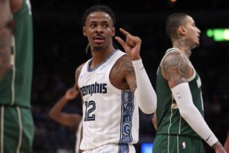 Memphis Grizzlies guard Ja Morant (12) gestures during the third quarter against the Milwaukee Bucks at FedExForum.