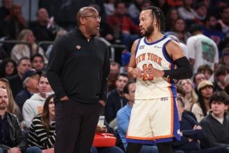 New York, New York, USA; New York Knicks head coach Mike Brown talks with guard Jalen Brunson (11) in the third quarter against the Philadelphia 76ers at Madison Square Garden. Mandatory Credit: Wendell Cruz-Imagn Images