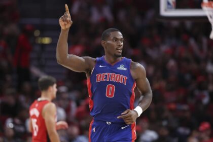 Houston, Texas, USA; Detroit Pistons center Jalen Duren (0) reacts after making a basket during the second quarter against the Houston Rockets at Toyota Center. Mandatory Credit: Troy Taormina-Imagn Images