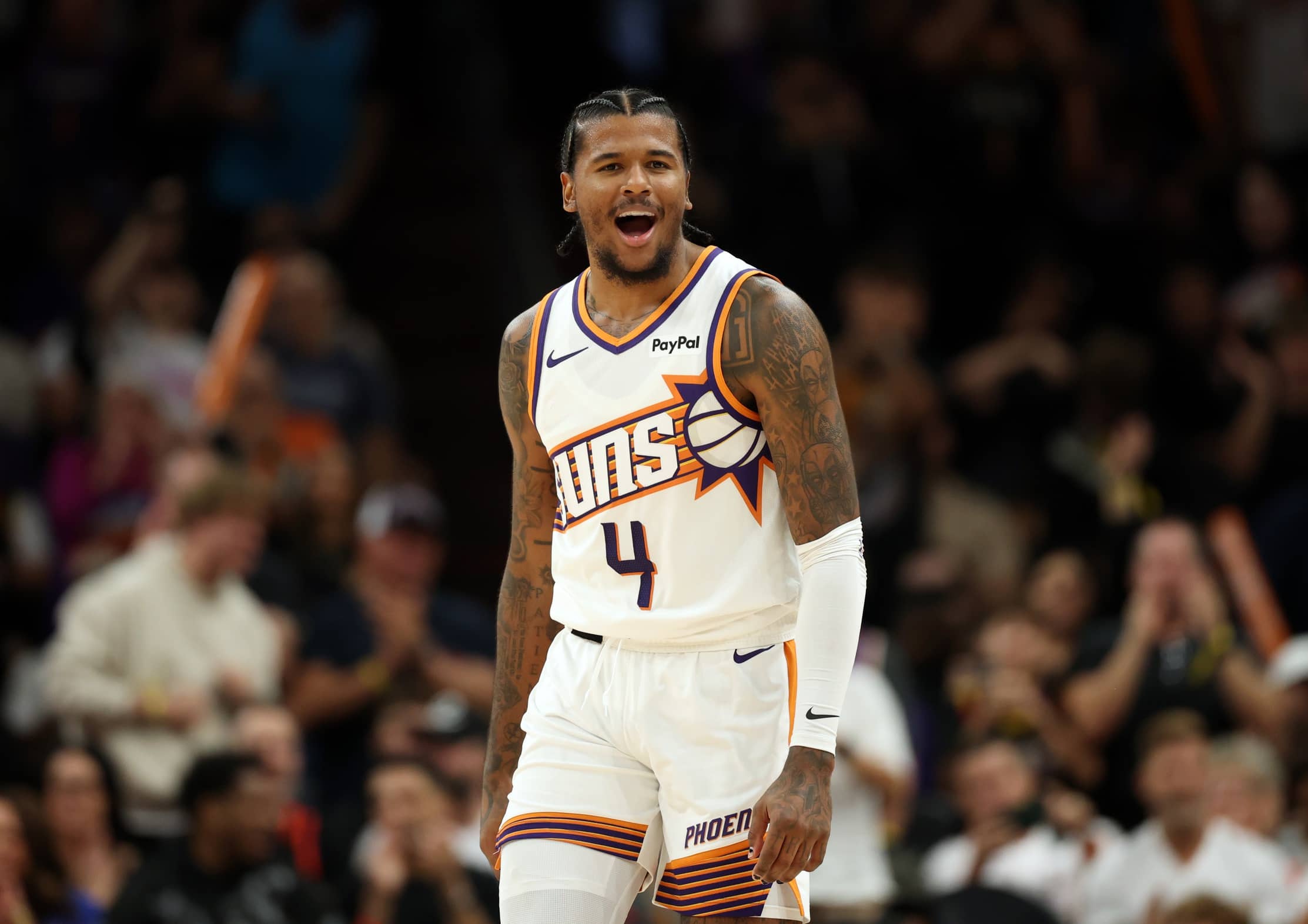 Nov 6, 2025; Phoenix, Arizona, USA; Phoenix Suns guard Jalen Green (4) celebrates against the Los Angeles Clippers at the Mortgage Matchup Center. Mandatory Credit: Mark J. Rebilas-Imagn Images