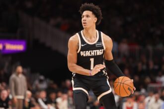 Atlanta Hawks forward Jalen Johnson (1) shoots against the Boston Celtics in the second quarter at State Farm Arena.