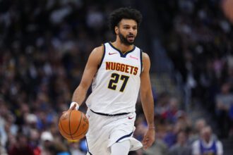 Jan 29, 2026; Denver, Colorado, USA; Denver Nuggets guard Jamal Murray (27) controls the ball in first quarter against the Brooklyn Nets at Ball Arena. Mandatory Credit: Ron Chenoy-Imagn Images