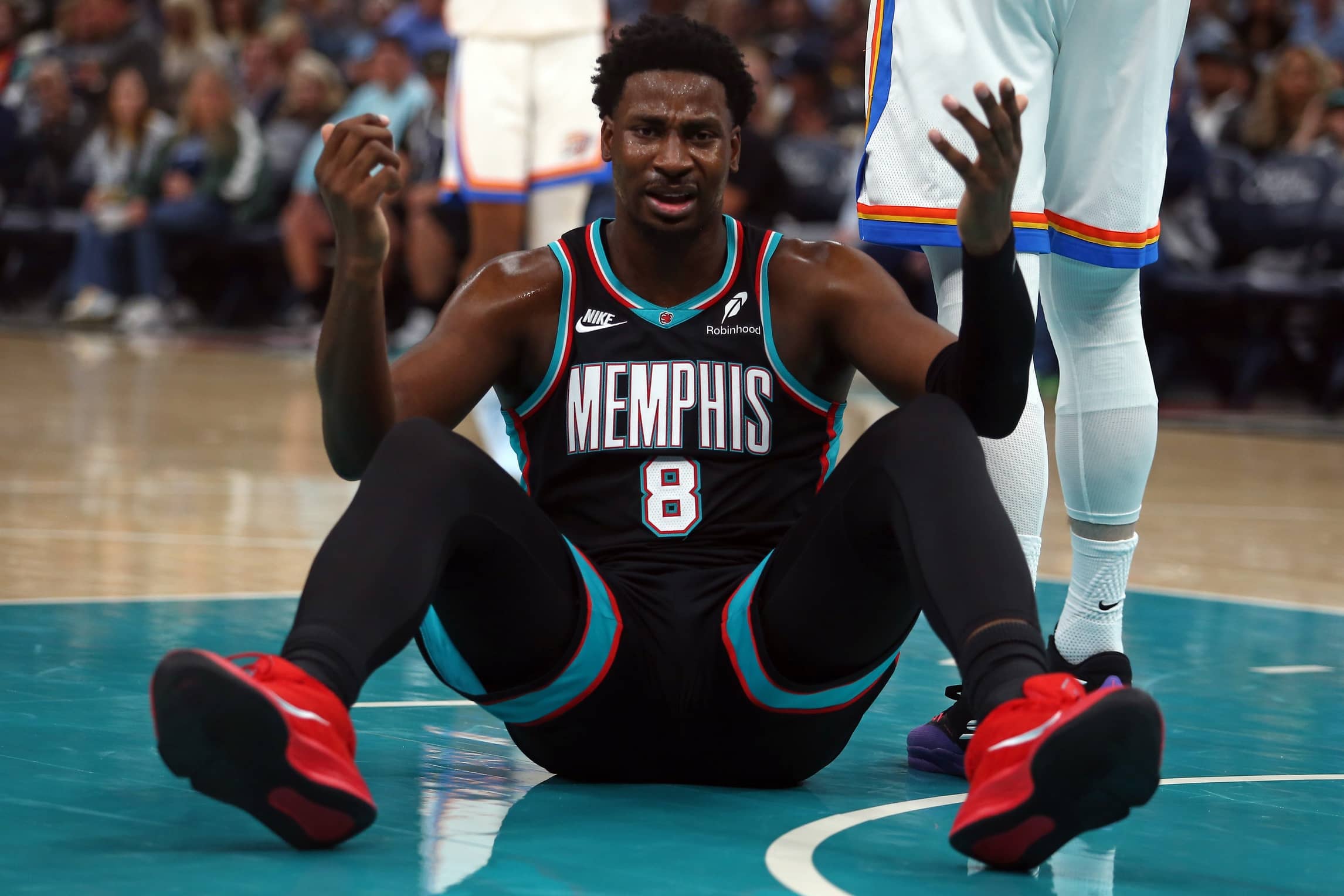 Memphis Grizzlies forward/center Jaren Jackson Jr. (8) reacts during the first quarter against the Oklahoma City Thunder at FedExForum.