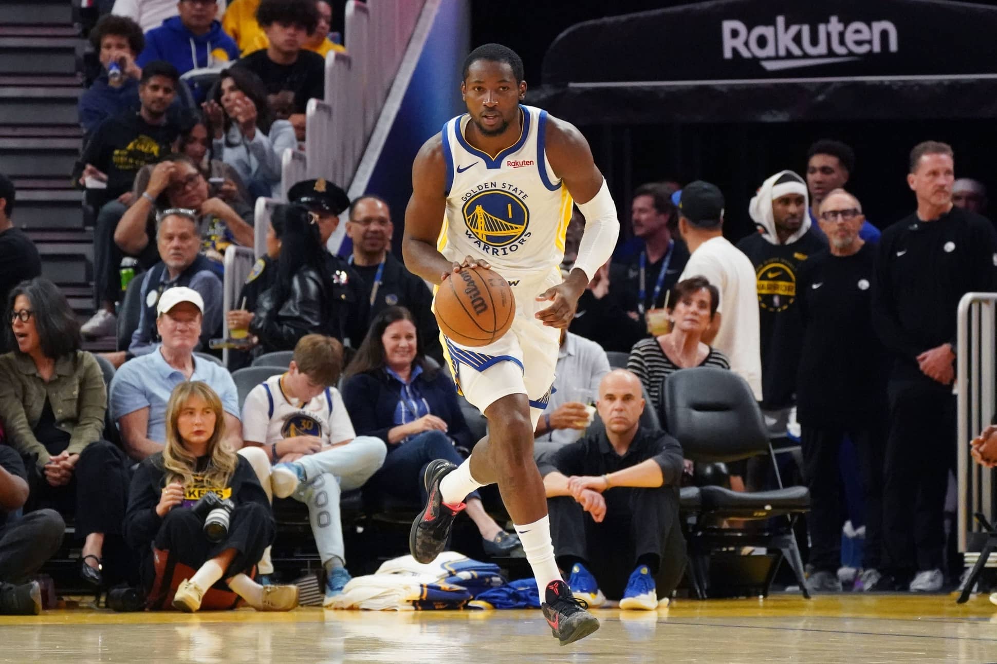 Oct 5, 2025; San Francisco, California, USA; Golden State Warriors forward Jonathan Kuminga (1) dribbles upcourt against the Los Angeles Lakers in the third quarter at Chase Center. Mandatory Credit: David Gonzales-Imagn Images