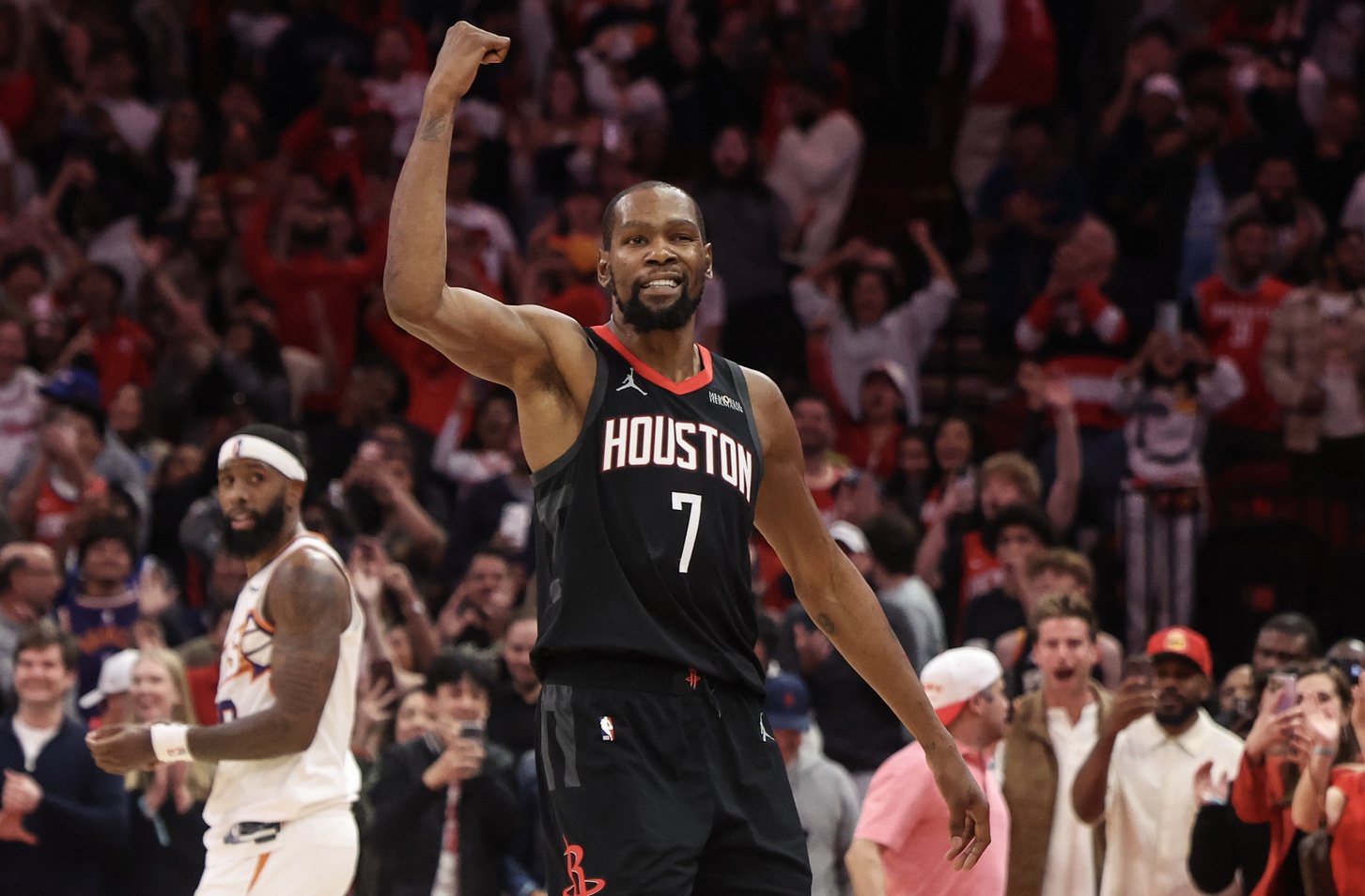 Jan 5, 2026; Houston, Texas, USA; Houston Rockets Kevin Durant (7) celebrates his three point winning basket against the Phoenix Suns in the fourth quarter at Toyota Center. Mandatory Credit: Thomas Shea-Imagn Images