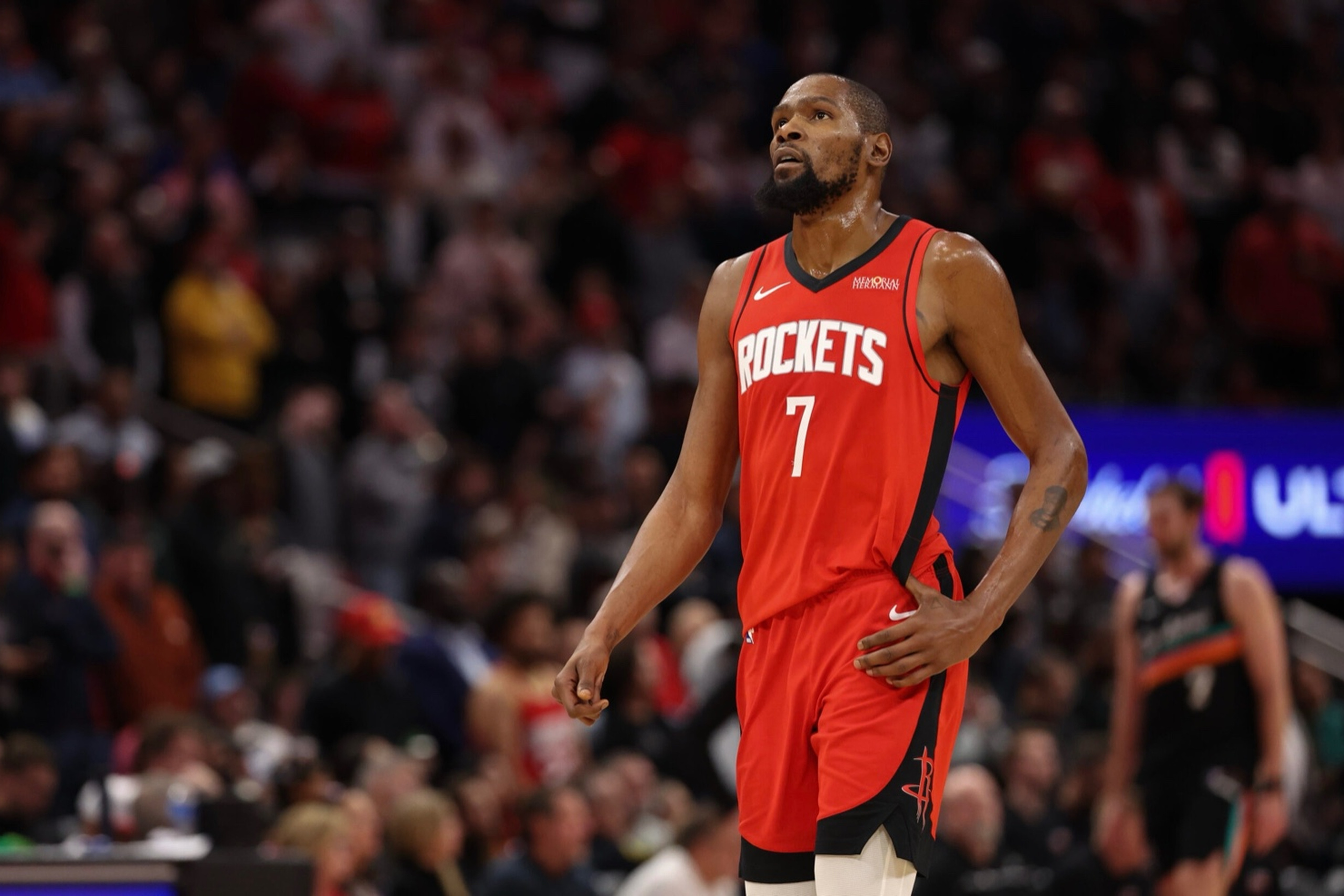 Jan 20, 2026; Houston, Texas, USA; Houston Rockets forward Kevin Durant (7) looks up at the replay board while playing against the San Antonio Spurs timeout in the second half at Toyota Center. Mandatory Credit: Thomas Shea-Imagn Images