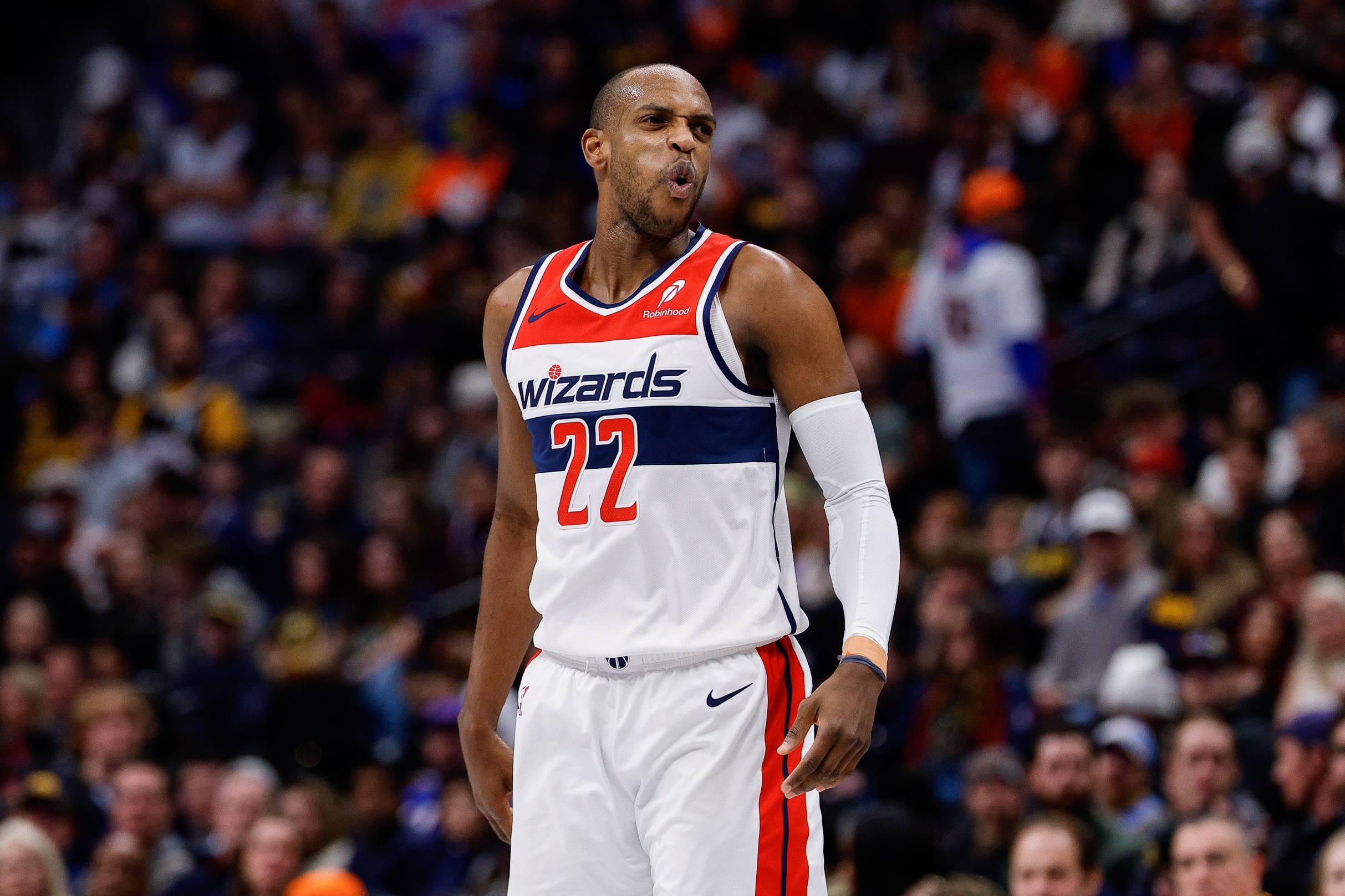 Jan 17, 2026; Denver, Colorado, USA; Washington Wizards forward Khris Middleton (22) reacts in the third quarter against the Denver Nuggets at Ball Arena. Mandatory Credit: Isaiah J. Downing-Imagn Images