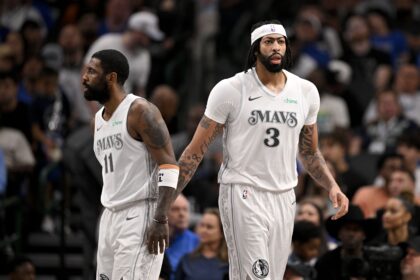 Feb 8, 2025; Dallas, Texas, USA; Dallas Mavericks guard Kyrie Irving (11) and forward Anthony Davis (3) during the game between the Dallas Mavericks and the Houston Rockets at the American Airlines Center. Mandatory Credit: Jerome Miron-Imagn Images
