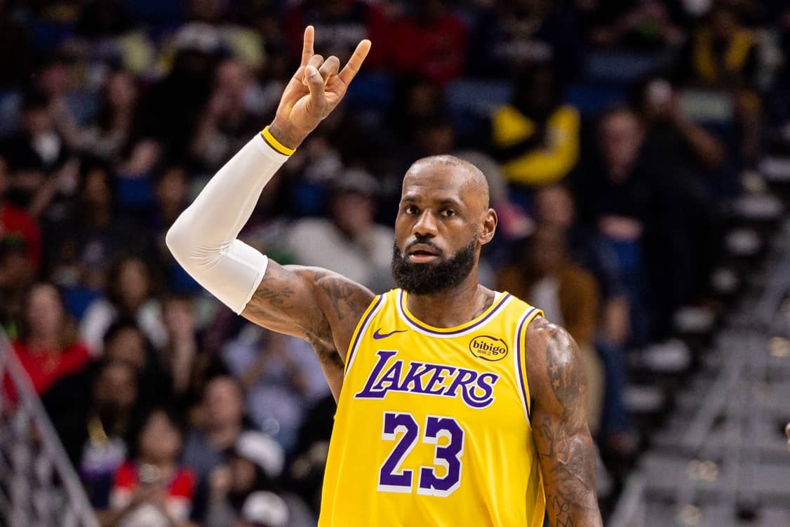 Los Angeles Lakers forward LeBron James (23) brings the ball up court against the New Orleans Pelicans during the first half at Smoothie King Center.