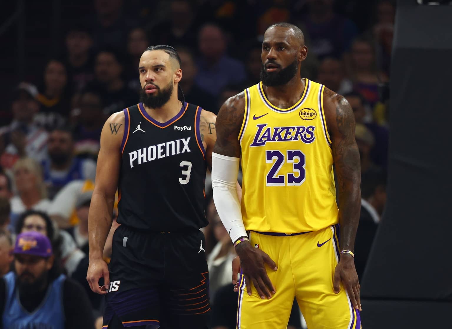 Los Angeles Lakers forward LeBron James (23) against Phoenix Suns forward Dillon Brooks (3) at Mortgage Matchup Center.