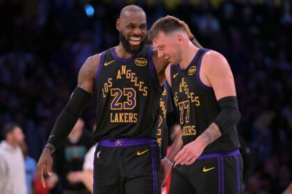 Jan 2, 2026; Los Angeles, California, USA; Los Angeles Lakers forward LeBron James (23) and Los Angeles Lakers guard Luka Doncic (77) walk to the bench during a time out in the second half at Crypto.com Arena. Mandatory Credit: Jayne Kamin-Oncea-Imagn Images