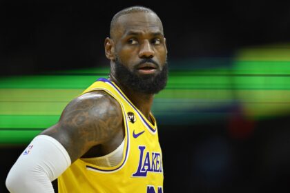 Cleveland, Ohio, USA; Los Angeles Lakers forward LeBron James (23) stands on the court in the third quarter against the Cleveland Cavaliers at Rocket Arena. Mandatory Credit: David Richard-Imagn Images