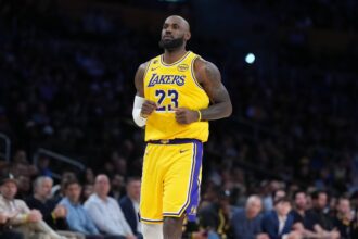 Los Angeles, California, USA; Los Angeles Lakers forward LeBron James (23) reacts against the Charlotte Hornets in the first half at Crypto.com Arena. Mandatory Credit: Kirby Lee-Imagn Images