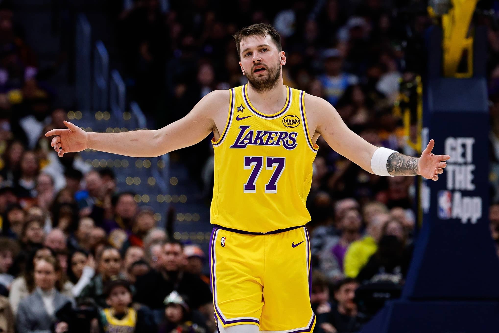 Denver, Colorado, USA; Los Angeles Lakers guard Luka Doncic (77) reacts after a play in the third quarter against the Denver Nuggets at Ball Arena. Mandatory Credit: Isaiah J. Downing-Imagn Images
