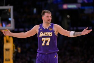Los Angeles Lakers guard Luka Doncic (77) reacts after a foul on Dallas Mavericks forward Naji Marshall (13) in the second half at Crypto.com Arena.